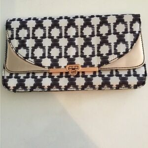 H&M fold over black and white patterned clutch.